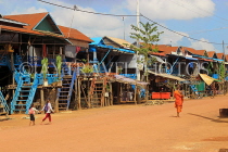 CAMBODIA, Tonle Sap Lake, Kampong Phluk Fishing Village, houses on stilts, CAM1350JPL