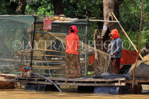 CAMBODIA, Tonle Sap Lake, Kampong Phluk Fishing Village, sorting nets, CAM1372JPL