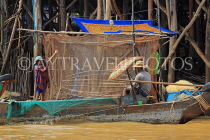 CAMBODIA, Tonle Sap Lake, Kampong Phluk Fishing Village, sorting nets, CAM1373JPL