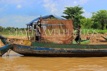 CAMBODIA, Tonle Sap Lake, Kampong Phluk Fishing Village, sorting nets, CAM1375JPL