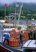 CANADA, Nova Scotia, fishermen with nets, on trawler, CAN687JPL
