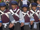 CHINA, Yunnan Province, Lijiang, Naxi women in traditional dance, CH1567JPL