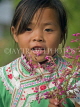 CHINA, Yunnan Province, Yuanyang, Hani hill tribe girl with flowers, CH1661JPL