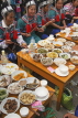 CHINA, Yunnan Province, Yuanyang, Long Table Festival, Hani (Akha) women eating, CH1644JPL