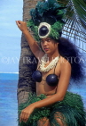 COOK ISLANDS, Rarotonga, beach, Maori girl in traditional island dress, CI963JPL