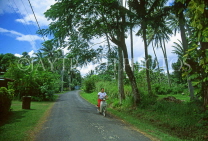 COOK ISLANDS, Rarotonga, country lane and moped, CI783JPL