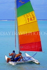 COOK ISLANDS, Rarotonga, islanders setting sailboat out to sea, CI143JPL