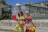 CUBA, Havana, old town, women in colourful traditional dress posing, CUB356JPL