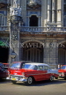 CUBA, Havana, red American car against colonial architecture, CUB1043JPL