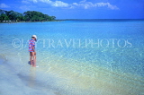 CUBA, Playa Larga, beach and seascape, boy paddling, CUB194JPL