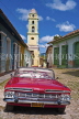 CUBA, Trinidad, old Chevy Convertible and Belltower of Luncha Contra Bandidos Museum, CUB369JPL