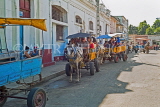 CUBA, Trinidad, old town street, and horse drawn carts, CUB362JPL