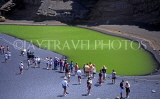 Canary Isles, LANZAROTE, Emerald Green Lagoon (El Golfo) and visitors, LAZ204JPLA