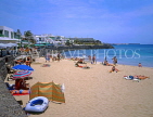 Canary Isles, LANZAROTE, Playa Blanca (beach), seafront and sunbathers, LAZ269JPL