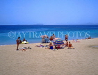 Canary Isles, LANZAROTE, Playa Blanca (beach) and sunbathers, LAZ280JPL