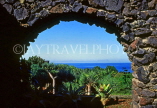 Canary Isles, TENERIFE, Puerto de la Cruz, Botanical Gardens, view through stone arch, TEN144JPL