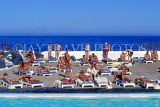 Canary Isles, TENERIFE, Puerto de la Cruz, Lido, sunbathers by the pool, SPN1335JPL