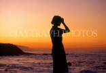 Canary Isles, TENERIFE, Puerto de la Cruz, coast at sunset and tourist, SPN1330JPL