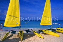 Cayman Islands, GRAND CAYMAN, Seven Mile Beach, and yellow sail catamarans, CAY211JPL