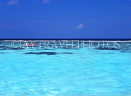 Cayman Islands, GRAND CAYMAN, Seven Mile Beach, seascape with kayak, CAY217JPL