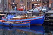 DENMARK, Copenhagen, Christianshavn, canalside boats, DEN124JPL