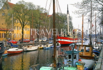 DENMARK, Copenhagen, Christianshavn, canalside boats, DEN133JPL