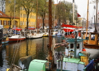 DENMARK, Copenhagen, Christianshavn, canalside boats, DEN149JPL
