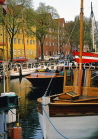DENMARK, Copenhagen, Christianshavn, canalside boats, DEN155JPL