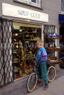 DENMARK, Copenhagen, boy browsing in antique shop window, DEN128JPL
