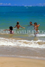 DOMINICAN REPUBLIC, North Coast, beach at Puerto Plata, Playa Dorada, children playing, DR469JPL