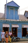 DOMINICAN REPUBLIC, Puerto Plata, old building with balcony, and shoppers, DR464JPL