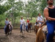 DOMINICAN REPUBLIC, countryside, tourists pony trekking, DR277JPL