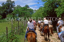 DOMINICAN REPUBLIC, countryside, tourists pony trekking, DR429JPL