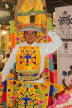 ECUADOR, Quito, man dressed in festival costume, ECU148JPL