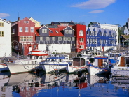 FAROE ISLANDS, Streymoy, Torshavn, waterfront buildings, and harbour boats, FAR48JPL
