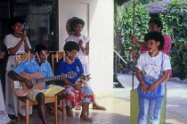 FIJI, Mamanuca Islands, Matamanoa Island, musicians playing farewell song, FIJ679JPL
