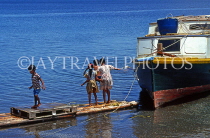 FIJI, Vanua Levu, seaside, moored boat and children, FIJ867JPL