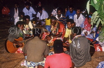 FIJI, Viti Levu, Meke, villagers gathered for a Meke (song & dance), FIJ1235JPL