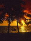 FIJI, Viti Levu Island, Coral Coast, sunset with coconut trees and hammock, FIJ501JPL