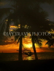 FIJI, Viti Levu Island, Coral Coast, sunset with coconut trees and hammock, FIJ638JPL