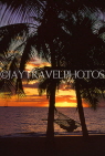 FIJI, Viti Levu Island, Coral Coast, sunset with coconut trees and hammock, FIJ875JPL