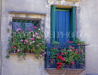 FRANCE, Languedoc-Roussillon, CAP DAGDE, AGDE, Old Town, wrought iron balconies with flowers, FR457JPL