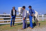 FRANCE, Languedoc-Roussillon, LA CAMARGUE, Cowboys with white horse, FRA610JPL