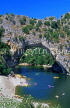FRANCE, Rhone-Alps, ARDECHE GORGE, Pont d'Arc and canoeists, FRA976JPL