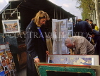 France, PARIS, Latin Quarter, people browsing through prints and posters stall, FRA2226JPL