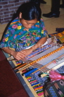 GUATEMALA, Guatemala City, woman weaving, traditional crafts, GUA274JPL