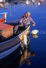 Greek Islands, CRETE, Agios Nikolaos, fisherman in small boat, GIS1121JPL