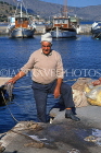 Greek Islands, CRETE, Elounda, fisherman with Octopus, GIS1279JPL