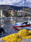 Greek Islands, CRETE, Elounda, town and harbourfront, fishing boats and nets, GIS1098JPL