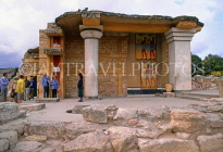 Greek Islands, CRETE, Iraklion, PALACE OF KNOSSOS, tour group, at the Great Proplyaea ruins, GIS1128JPL